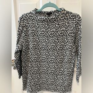 Like new Talbots 3/4 sleeve knit top. Black and white animal print.